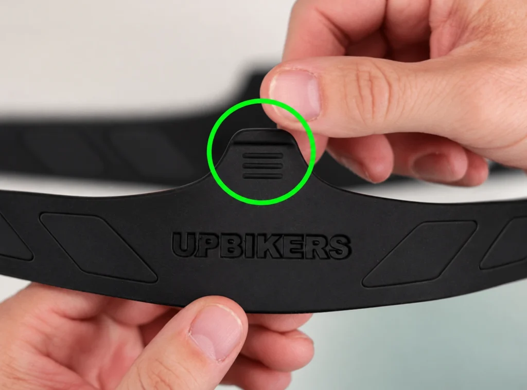 Solapa de la correa de Upbikers apuntando hacia arriba